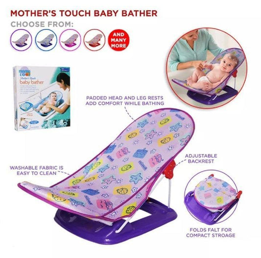 A white folding baby bather with a mesh sling, set in a kitchen sink, demonstrating its two-position recline for a comfortable infant bath.